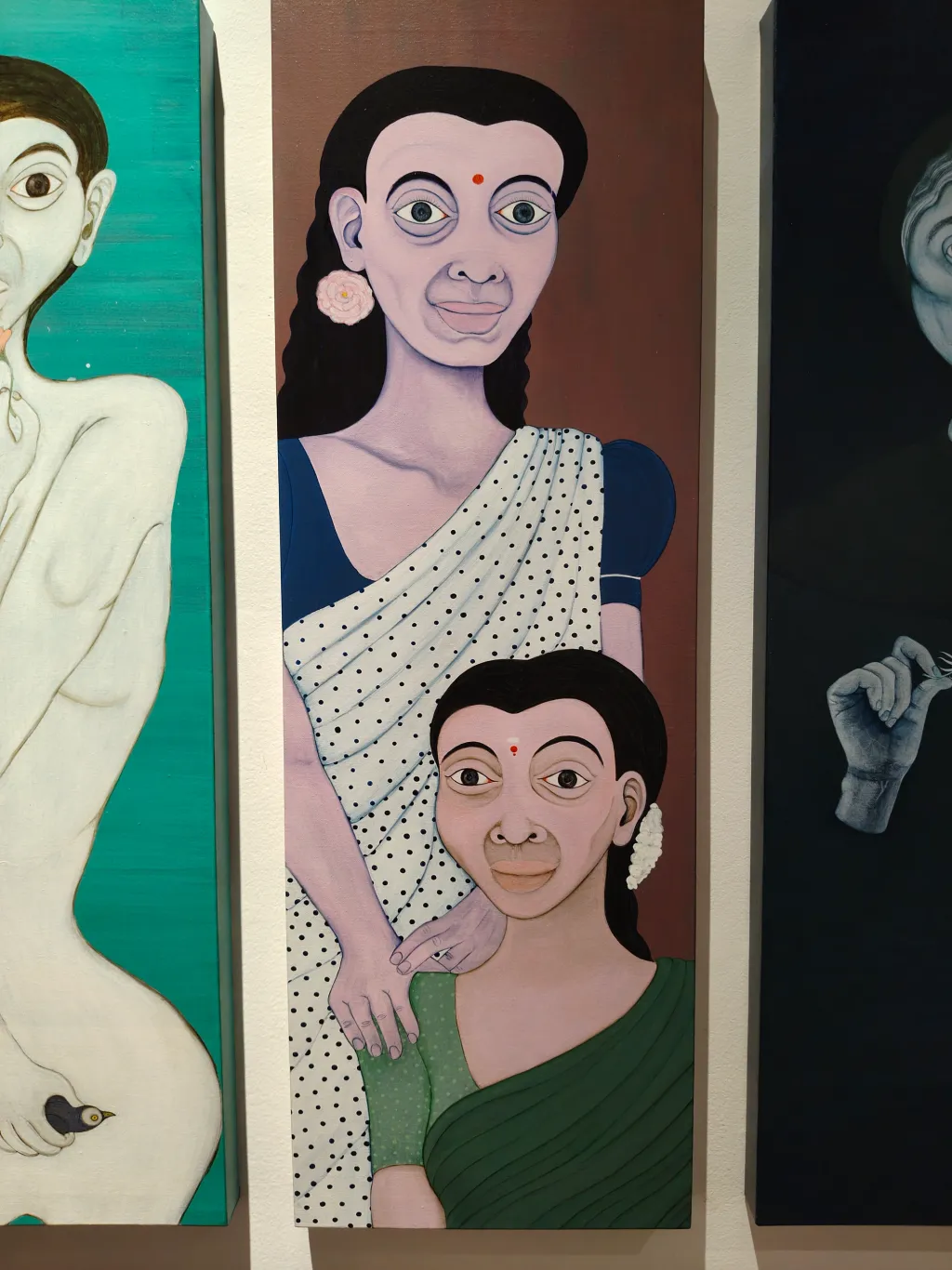 നിറങ്ങളുടെ സമൃദ്ധിയിലും ഫ്രിദ  ബാധിച്ച സർപ്പശിരസ്സിലും ഉറക്കെ സംസാരിക്കുന്ന ചിത്രങ്ങൾ നാക്കെറങ്ങിപ്പോയ  അവസ്ഥയിലെത്തുന്നത് വീണ്ടും കാമുകി ദൃശ്യമാകുന്ന സ്ഥലത്താണ് | Kaamukimar | Acrylic on Canvas | 91x31 cm