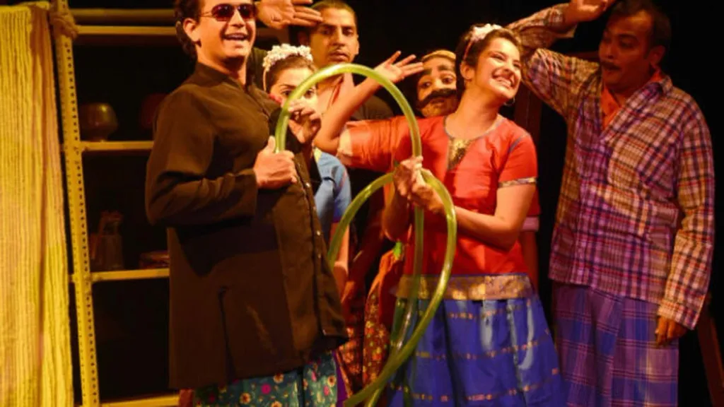 The set design eschews literalism, relying instead on the audience's imagination to breathe life into the space. 